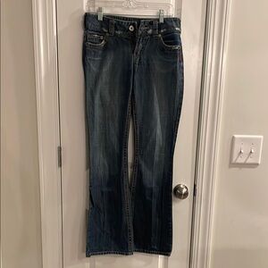 Lightly distressed Women's Blue Jeans
